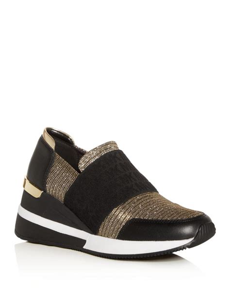 michael kors black wedge sneakers|michael kors black slip on.